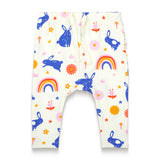 Cute toddler girl slouchy pants featuring a playful bunnies and rainbow print with vibrant colors, perfect for a cozy and stylish addition to your little one's everyday wardrobe, ideal for fun adventures.