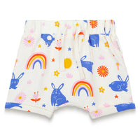 Toddler girl slouchy shorts with Bunnies and Rainbow print, featuring playful blue bunnies, colorful rainbows, flowers, and stars on a white background. Soft, breathable fabric for comfort.