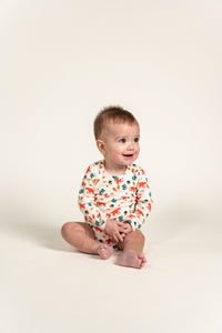 Toddler Boy Long Sleeve Bodysuit in playful Fox Forest Print featuring vibrant foxes, acorns, and leaves. Made from soft, breathable fabric, perfect for cozy comfort and everyday wear.