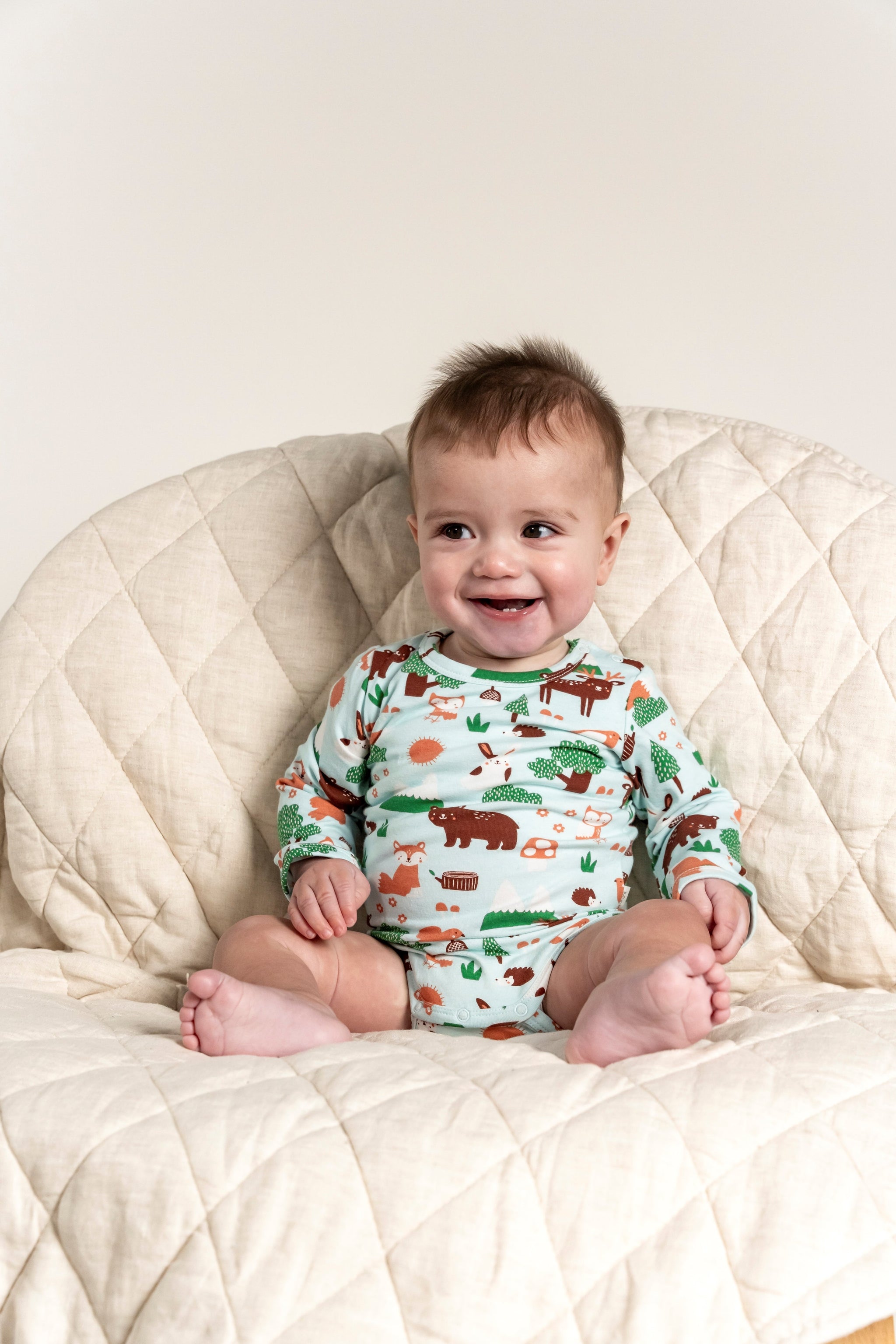 Toddler Boy Long Sleeve Bodysuit featuring a playful Forest Animal Print with bears, foxes, and trees. Soft and comfortable fabric, perfect for everyday wear. Ideal for baby boys, ages 0-24 months.